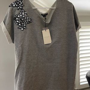 Gryphon New York short-sleeved sweatshirt with delicate beading across shoulder.